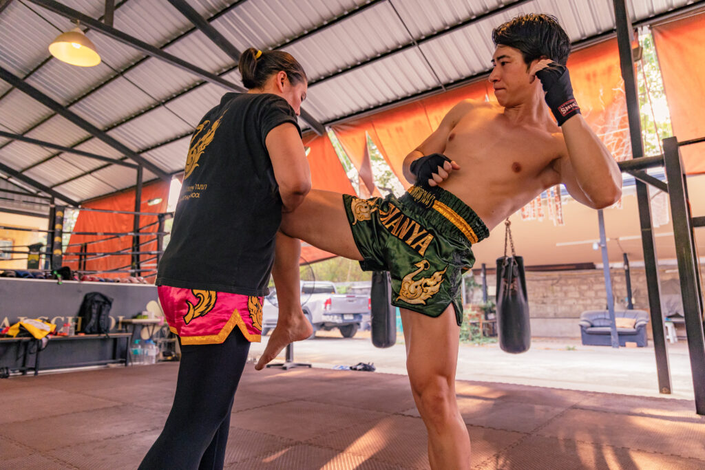 knee kicks at the thai boxing gym stock photos for reference