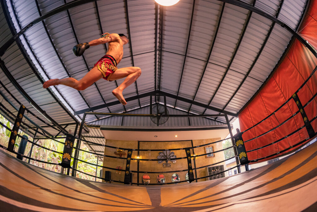 Jumping knee Muaythai Thailand@muscular men stock photos fore pose reference
