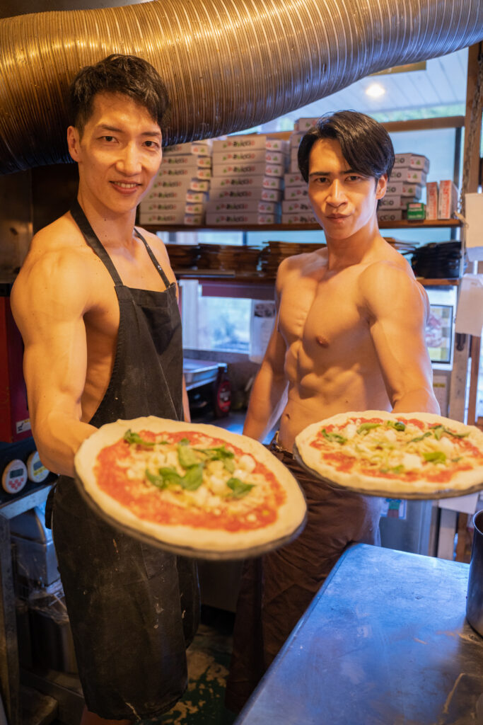muscle man at pizza shop@stock photo