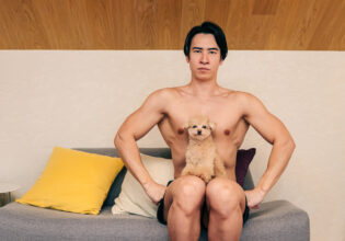 stock photo of dog and muscular men