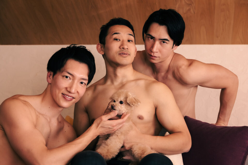Dog and muscular men