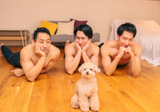 Dog and muscular men