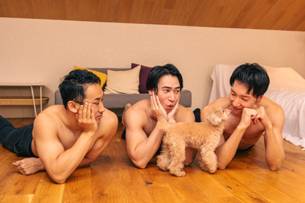 Dog and muscular men stock photo