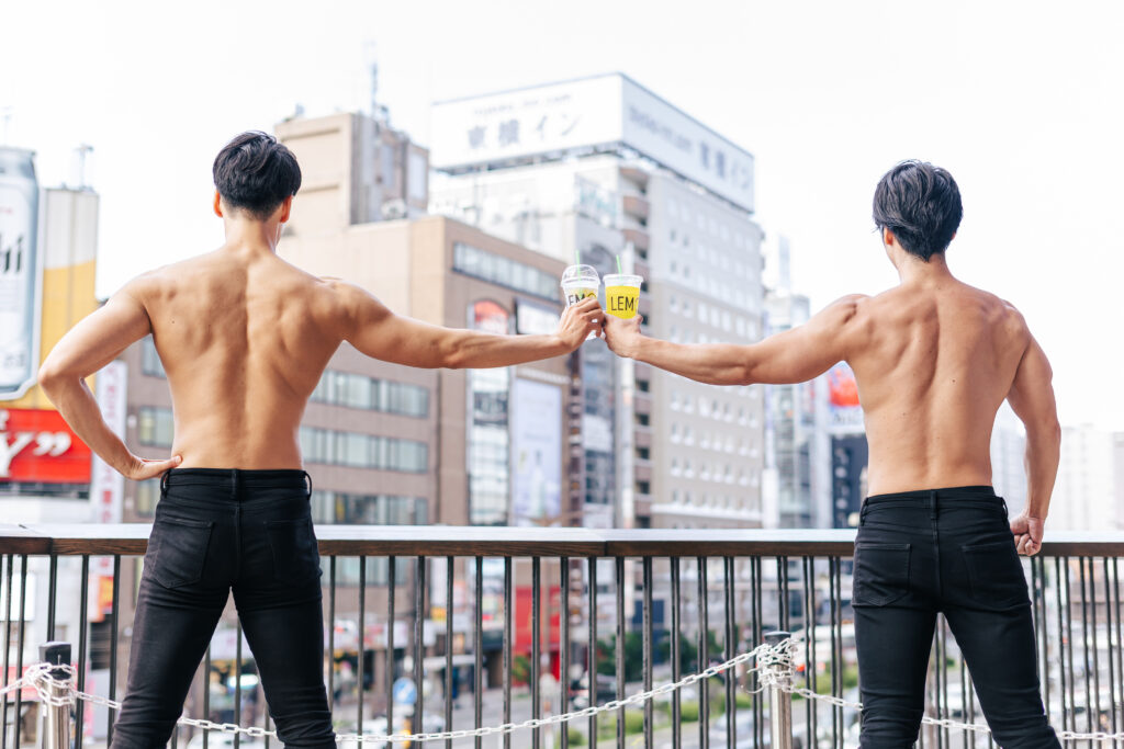 レモネードで乾杯するマッチョ/muscular men toast stock photo in Sappro Japan
